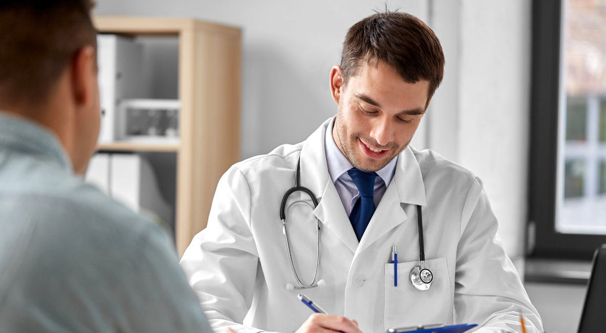 Male doctor with patient