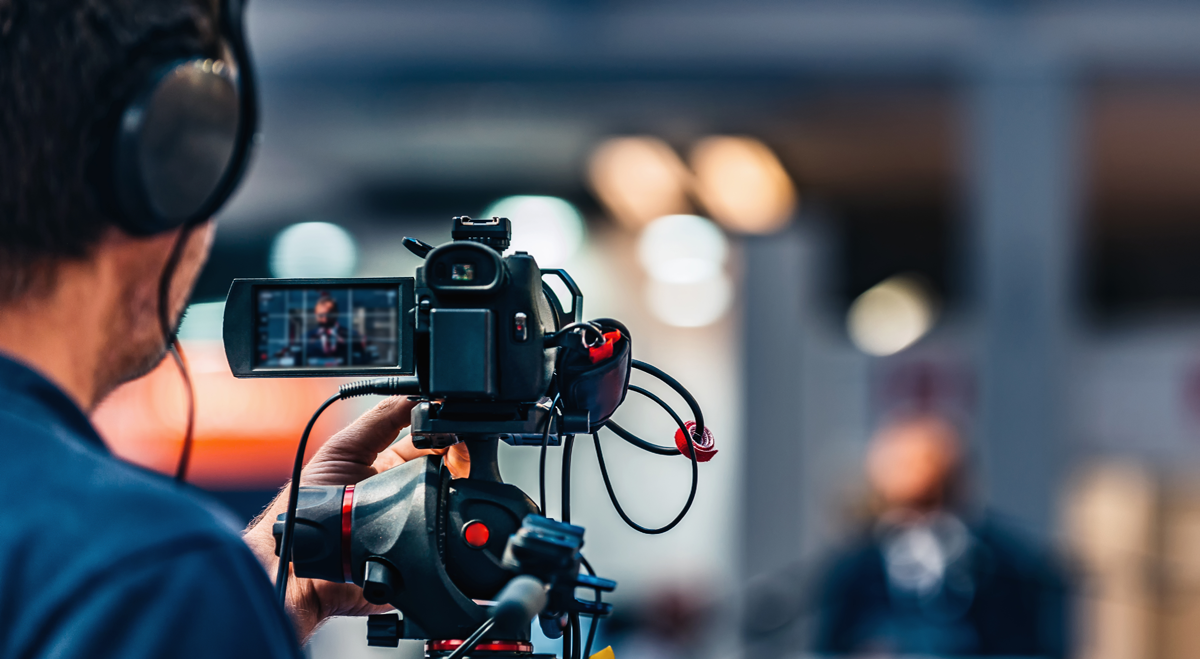 Man filming with video camera