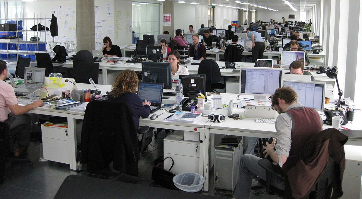 Workers in an open plan office