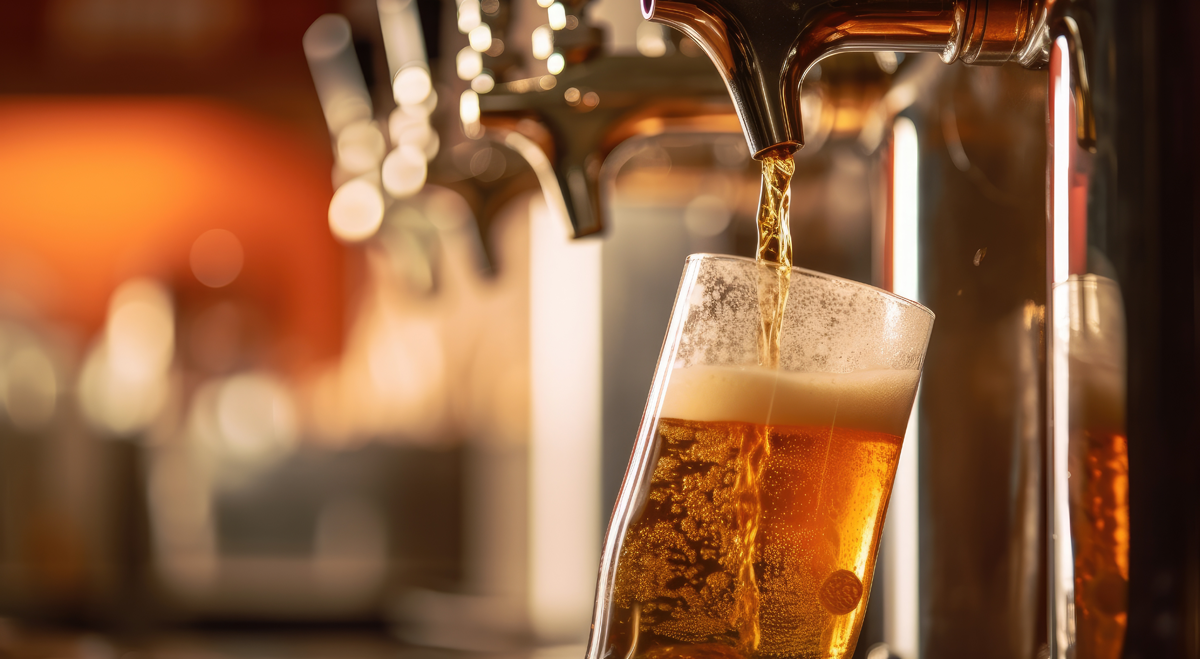 Beer being poured in a pub