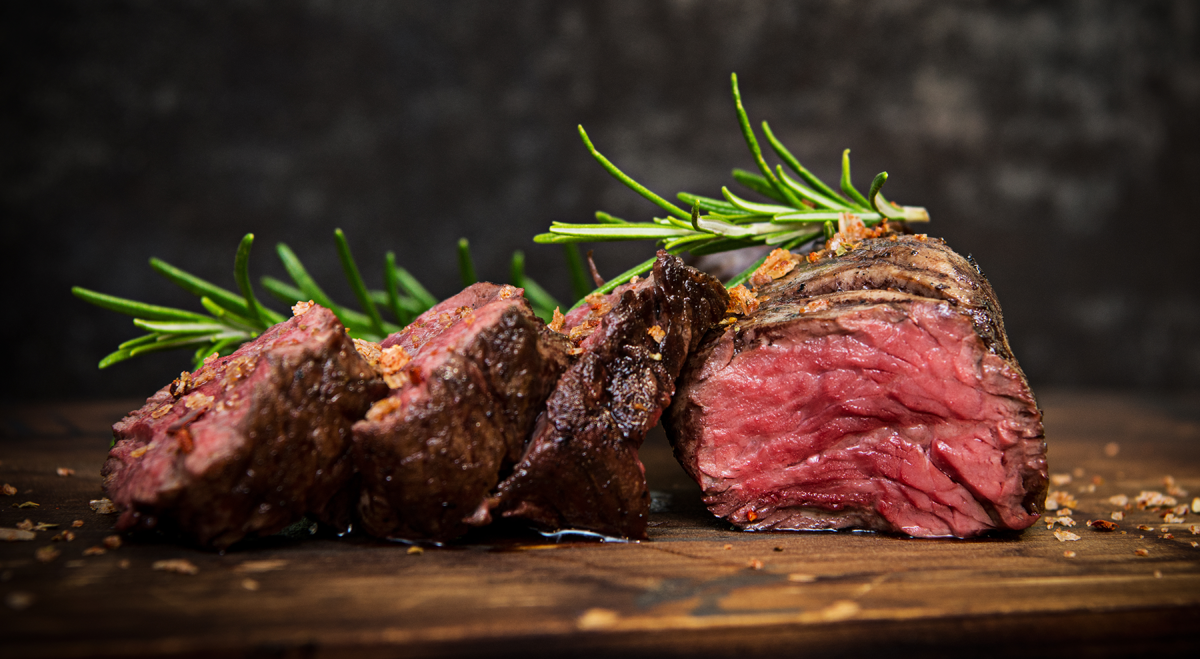 Steak carved into slices