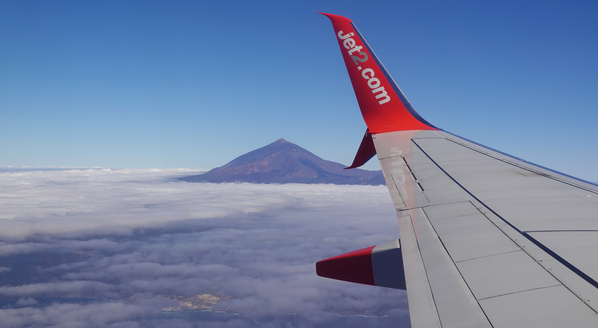 Jet2 plane flying over clouds