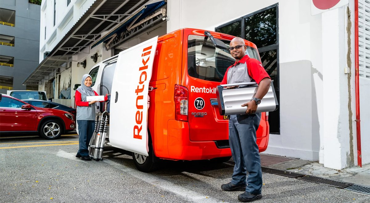 Rentokil van and staff