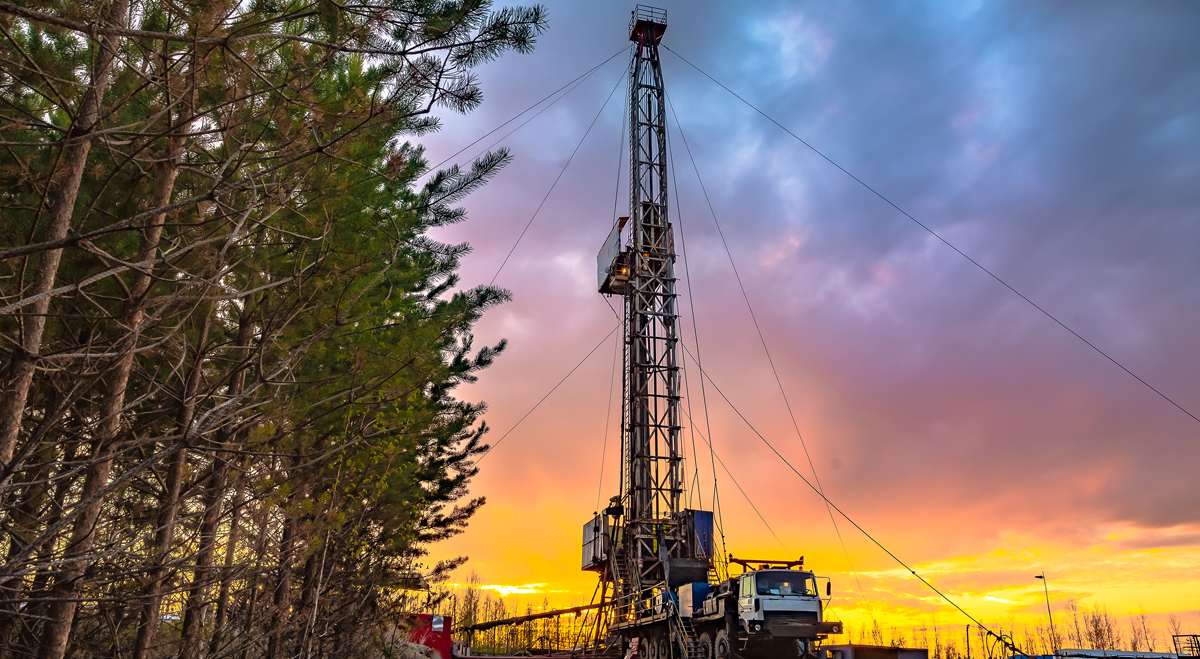 Oil rig at sunset