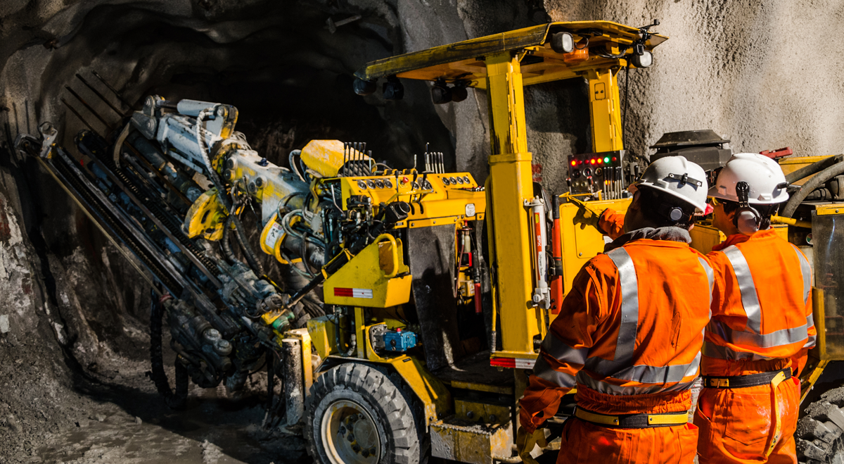 Miners with digging machine